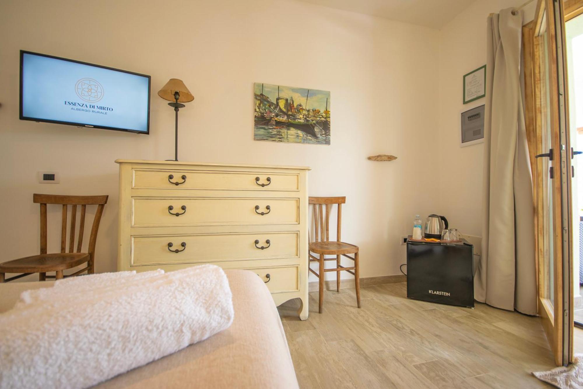 Hotel Essenza Di Mirto La Caletta Room photo