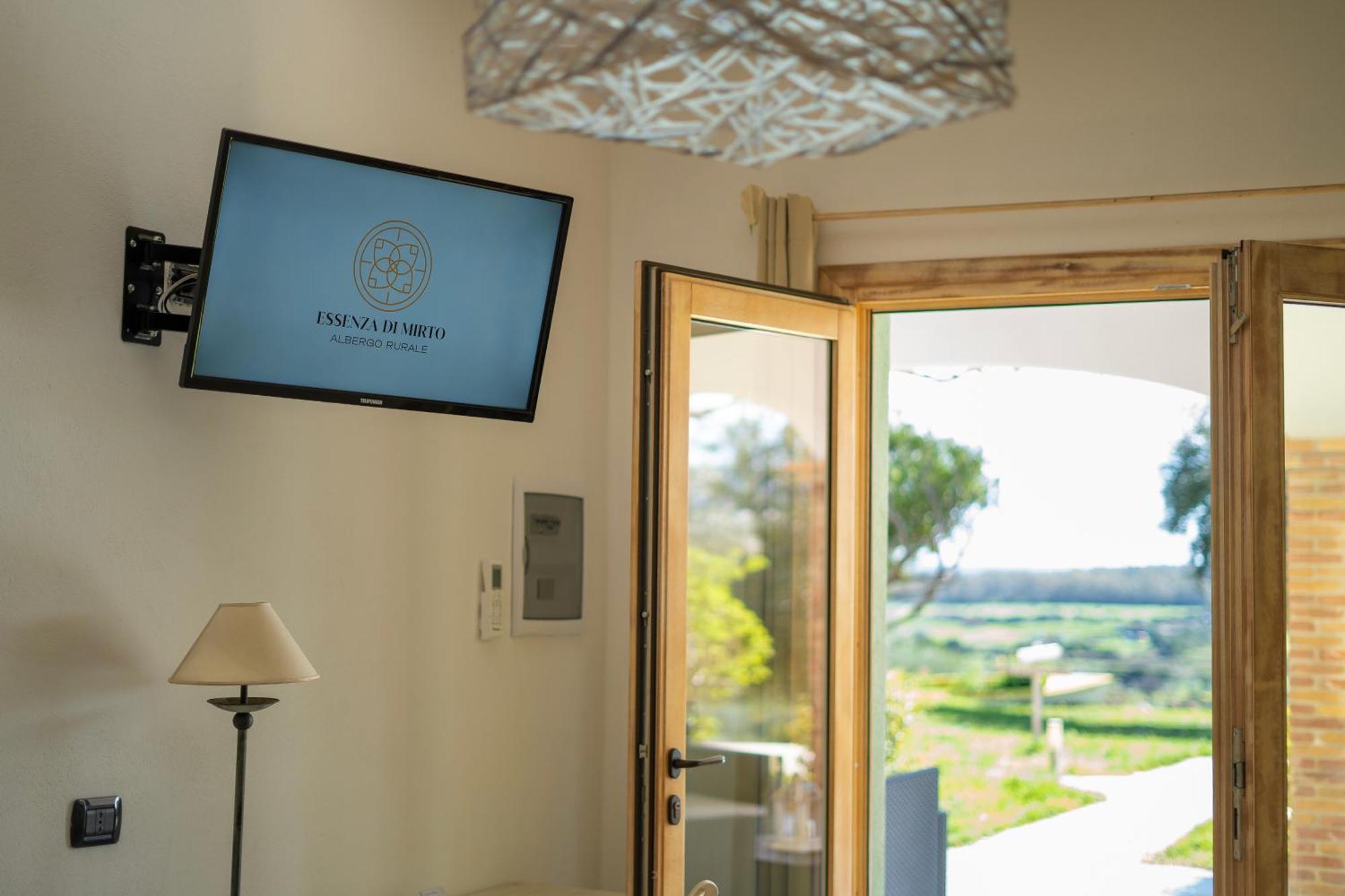 Hotel Essenza Di Mirto La Caletta Room photo