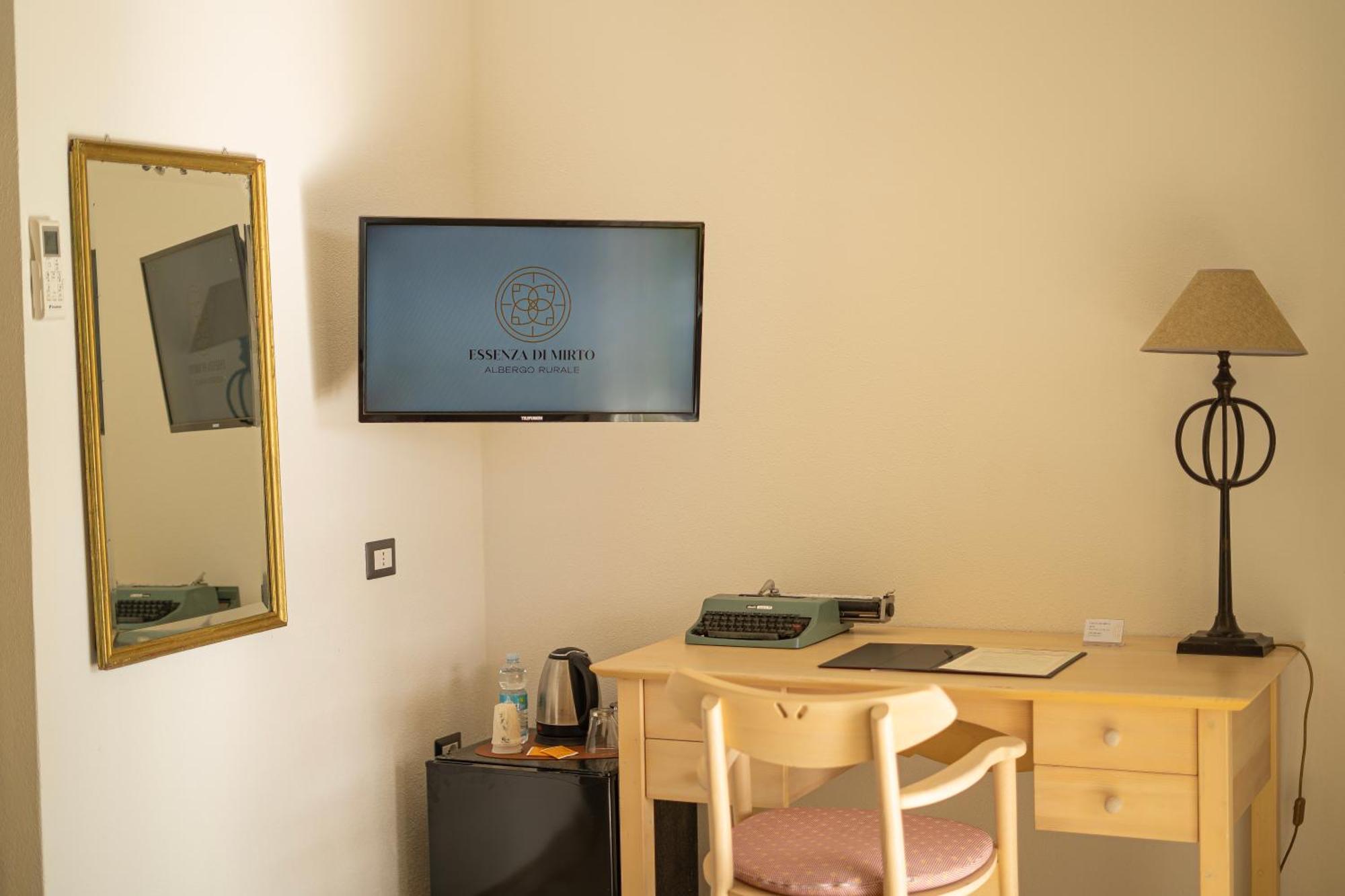 Hotel Essenza Di Mirto La Caletta Room photo